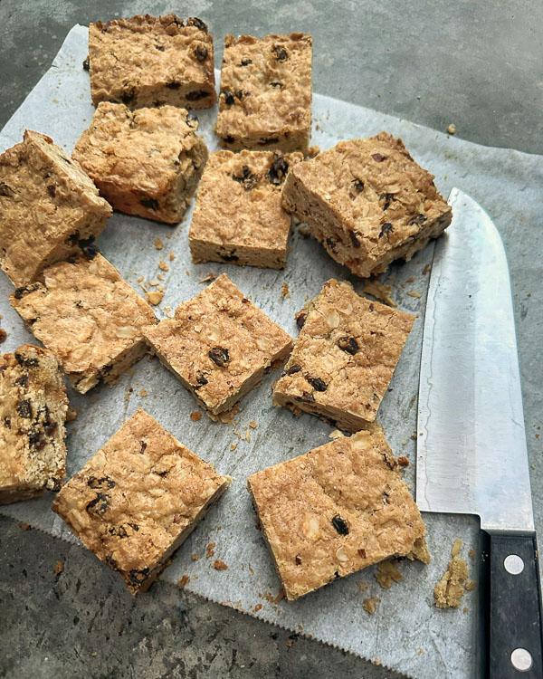 Oatmeal Raisin Bars taste like a cross between a blondie and an oatmeal raisin cookie. Find the recipe for this treat on Shutterbean.com! 