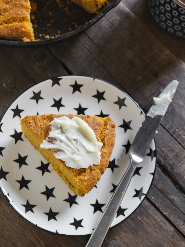 Sweet Potato Cornbread is slightly sweet and perfect paired with honey butter. Find the recipe on Shutterbean.com