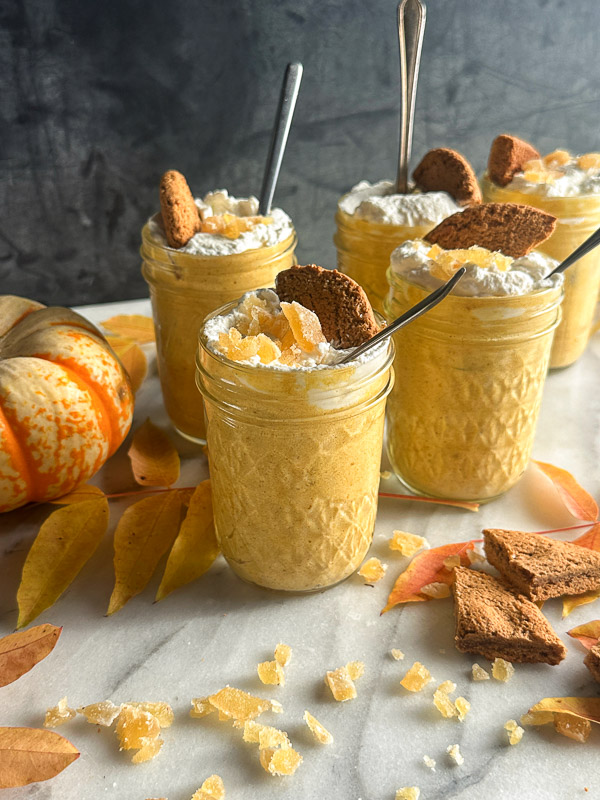 Creamy Ginger Pumpkin Mousse made with pumpkin, warm spices, fresh ginger, and homemade whipped cream. An easy, egg-free fall dessert perfect for Thanksgiving.