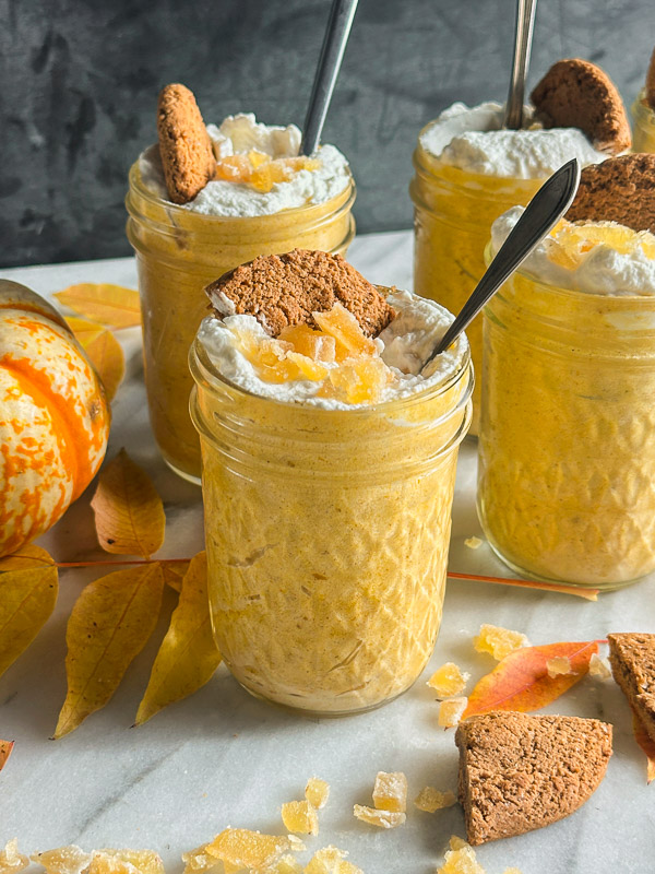 Creamy Ginger Pumpkin Mousse made with pumpkin, warm spices, fresh ginger, and homemade whipped cream. An easy, egg-free fall dessert perfect for Thanksgiving.