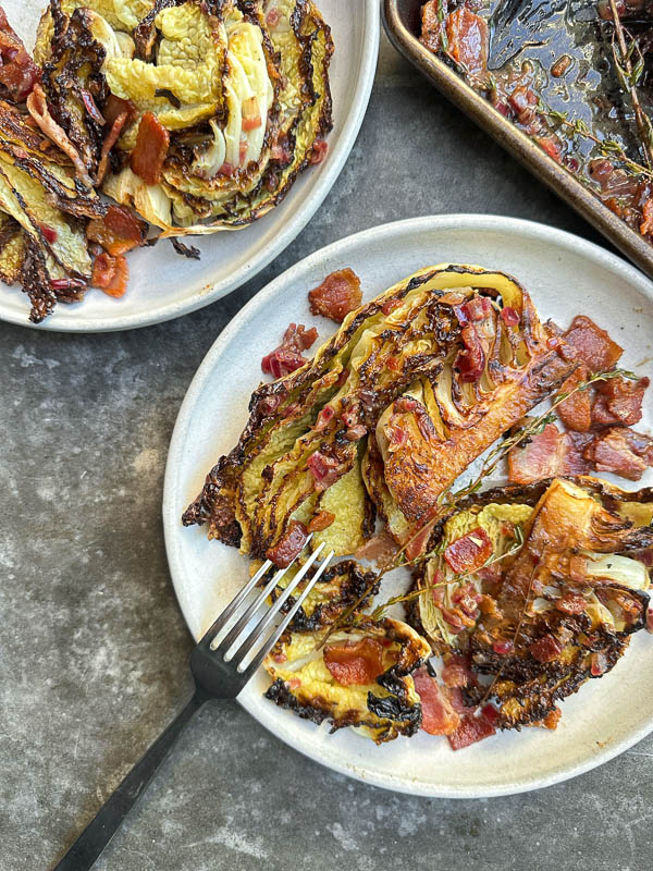 Try this Maple Bacon Cabbage recipe! Roasted cabbage wedges with crispy bacon and a homemade maple Dijon dressing. Easy, flavorful, gluten-free side dish for fall dinners, Thanksgiving, or meal prep. #vegetableside #cabbagerecipes #shutterbean